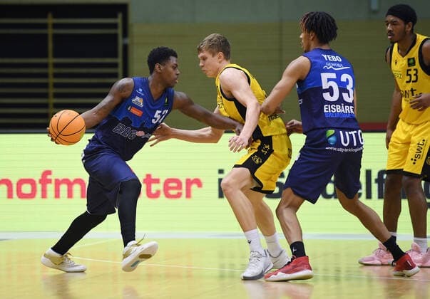 Basketball 2 Bundesliga 2020 2021 17 matchday in Rottenburg at Volksbank Arena 23 01 2021 Tigers Tuebingen Eisbaeren Bremerhaven Armani Moore li, Eisbaeren Bremerhaven vs Elias Valtonen centre, Tigers and Kevin Yebo 2 v re, Eisbaeren Bremerhaven and Isaiah Crawley r, Tigers