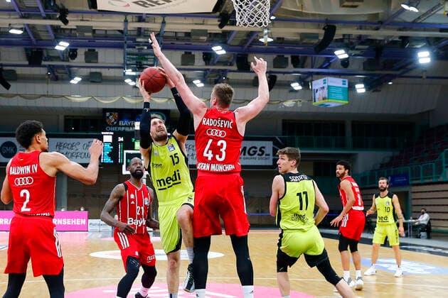 14 Matchday of the easyCredit BBL Basketball Bundesliga at Oberfrankenhalle in Bayreuth Season 2020 2021 Medi Bayreuth vs FC Bayern München Matthew Tiby Medi Bayreuth 15 left Leon Radosevic FC Bayern München 43 right