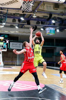 14 Matchday of the easyCredit BBL Basketball Bundesliga at Oberfrankenhalle in Bayreuth Season 2020 2021 Medi Bayreuth vs FC Bayern München Bastian Doreth Medi Bayreuth 10 right Leon Radosevic FC Bayern München 43 left