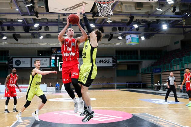 14 Matchday of the easyCredit BBL Basketball Bundesliga at the Oberfrankenhalle in Bayreuth Season 2020 2021 Medi Bayreuth vs FC Bayern München Matthew Tiby Medi Bayreuth 15 right Paul Zipser FC Bayern München 16 left