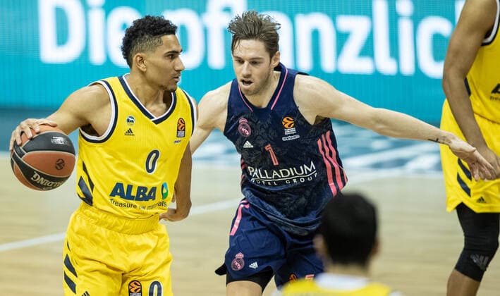 Basketball Euroleague, Alba Berlin Real Madrid, Main Round, 23 Matchday, Mercedes Benz Arena Fabien Causeur r of Real Madrid fights ALBAs Maodo Lo for the ball ALBA Berlin Real Madrid