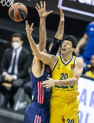 Basketball Euroleague, Alba Berlin Real Madrid, Main Round, Matchday 23, Mercedes Benz Arena ALBAs Simone Fontecchio r jumps to the basket against Alberto Abalde of Real Madrid ALBA Berlin Real Madrid