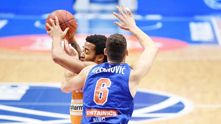 Basketball 1 Bundesliga, Season 2020 2021, 15 Matchday, Syntainics MBC Weissenfels vs ratiopharm Ulm 30 01 2021 Duel for the ball between Troy Caupain Guard ratiopharm Ulm, back number 23 li and Marko Krstanovic MBC Weissenfels, back number 6 during the match MBC Weissenfels vs Ulm 30 01 2021 Weissenfels Saxony Anhalt Germany Stadthalle Weissenfels