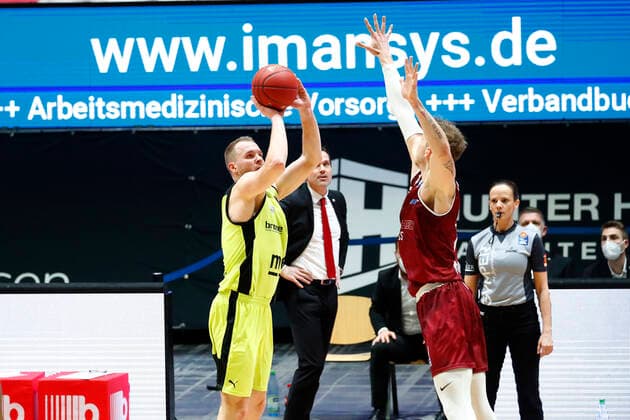 15 Matchday of the easyCredit BBL Basketball Bundesliga at Messe Chemnitz Season 2020 2021 NINERS Chemnitz vs Medi Bayreuth Osvaldas Olisevicius Medi Bayreuth 31 left Jan Niklas Wimberg NINERS Chemnitz 8 right