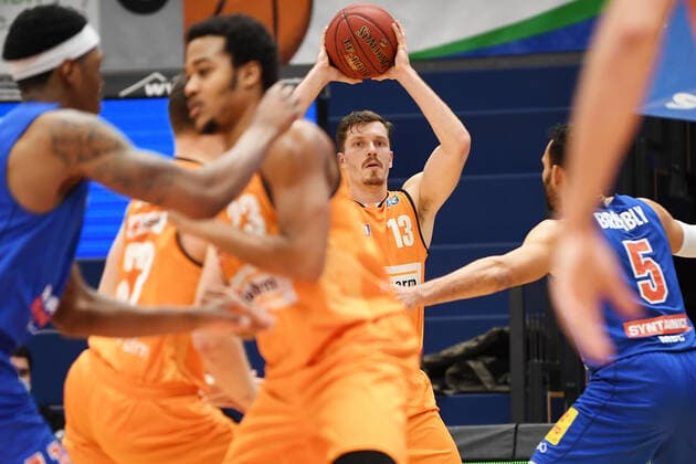 Basketball 1 Bundesliga, season 2020 2021, 15 matchday, Syntainics MBC Weissenfels vs ratiopharm Ulm 30 01 2021 92 104 52 51 Andreas Obst Guard ratiopharm Ulm, back number 13 center on the ball against David Brembly MBC Weissenfels, back number 5 during the game MBC Weissenfels vs Ulm 30 01 2021 Weissenfels Saxony Anhalt Germany Stadthalle Weissenfels