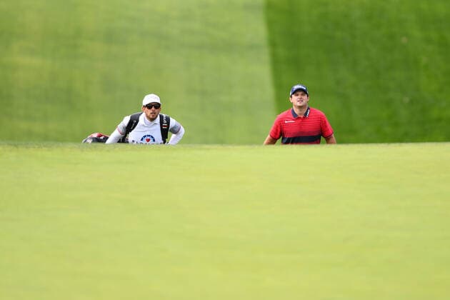 LA JOLLA, CA - JANUARY 31: Patrick Reed and his caddie Kessler Karain walk up to the 13th green on the South Course during the final round of the Farmers Insurance Open golf tournament at Torrey Pines Municipal Golf Course on January 31, 2021. The tournament was played without fans due to the COVID-19 pandemic. (Photo by Brian Rothmuller Icon Sportswire) GOLF: JAN 31 PGA, Golf Herren - Farmers Insurance Open Icon21013062