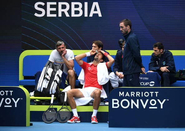 TENNIS ATP, Tennis Herren CUP, Novak Djokovic of Serbia is seen applying eye-drops during Round 1 of the ATP Cup against Denis Shapovalov of Canada at Melbourne Park in Melbourne, Tuesday, February 2, 2021. ( NO ARCHIVING, EDITORIAL USE ONLY, NO USE IN BOOKS WITHOUT CONSENT MELBOURNE VIC AUSTRALIA  Copyright: xDAVExHUNTx 20210202001517695682