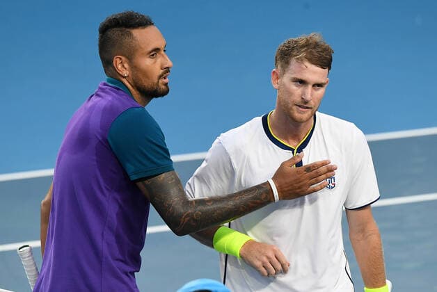TENNIS MURRAY RIVER OPEN, Nick Kyrgios of Australia reacts with Harry Bourchier following their Round 2 Murray River Open - ATP, Tennis Herren 250 match a at Melbourne Park in Melbourne, Wednesday, February 2, 2021. ( NO ARCHIVING, EDITORIAL USE ONLY, NO USE IN BOOKS WITHOUT CONSENT MELBOURNE VIC AUSTRALIA  Copyright: xDAVExHUNTx 20210203001517984827