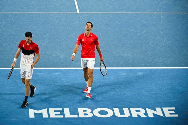 TENNIS ATP, Tennis Herren CUP, Nikola Cacic of Serbia (left) and Novak Djokovic of Serbia react during their ATP Cup doubles match against Alexander Zverev of Germany (right) and Jan-Lennard Struff of Germany at Melbourne Park in Melbourne, Friday, February 5, 2021. ( NO ARCHIVING, EDITORIAL USE ONLY, NO USE IN BOOKS WITHOUT CONSENT MELBOURNE VIC AUSTRALIA  Copyright: xDEANxLEWINSx 20210205001518446174