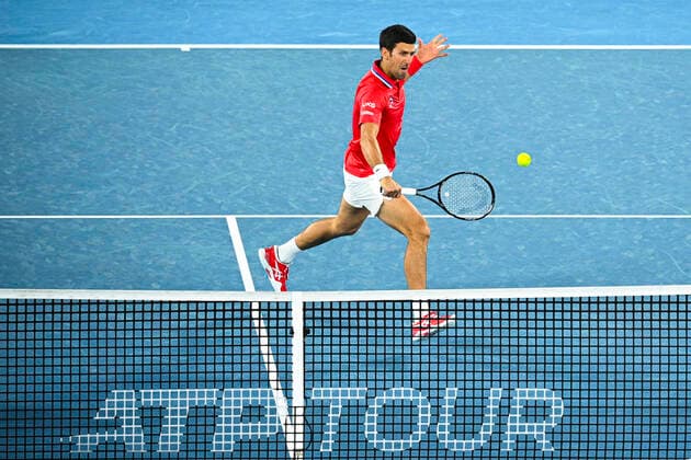 TENNIS ATP, Tennis Herren CUP, Novak Djokovic of Serbia in action during the ATP Cup doubles match against Alexander Zverev of Germany (right) and Jan-Lennard Struff of Germany at Melbourne Park in Melbourne, Friday, February 5, 2021. ( NO ARCHIVING, EDITORIAL USE ONLY, NO USE IN BOOKS WITHOUT CONSENT MELBOURNE VIC AUSTRALIA  Copyright: xDEANxLEWINSx 20210205001518455051