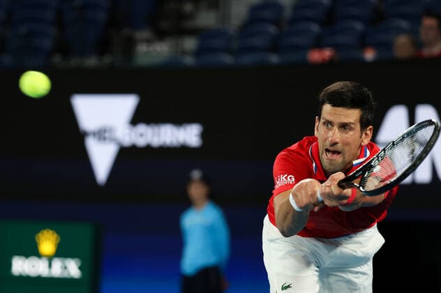 (210205) -- MELBOURNE, Feb. 5, 2021 -- Serbia s Novak Djokovic returns the ball against Germany s Alexander Zverev during the ATP, Tennis Herren Cup group A match between Serbia and Germany in Melbourne, Australia, on Feb. 5, 2021. ) (SP)AUSTRALIA-MELBOURNE-TENNIS-ATP CUP-GROUP A-SERBIA VS GERMANY BaixXuefei 