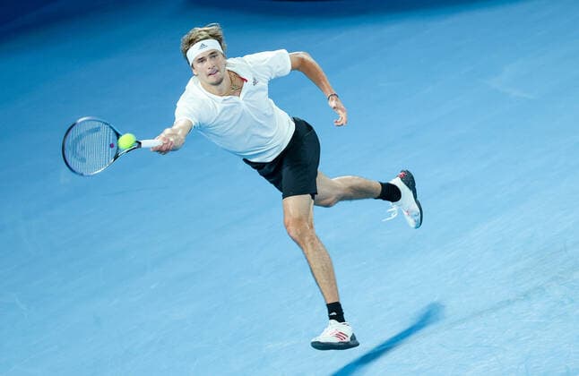 (210206) -- MELBOURNE, Feb. 6, 2021 -- Alexander Zverev of Germany returns a shot against Daniil Medvedev of Russia during their ATP, Tennis Herren Cup semifinal match between Russia and Germany in Melbourne Park, in Melbourne, Australia, on Feb. 6, 2021. ) (SP)AUSTRALIA-MELBOURNE-TENNIS-ATP CUP-RUSSIA VS GERMANY BaixXuefei 