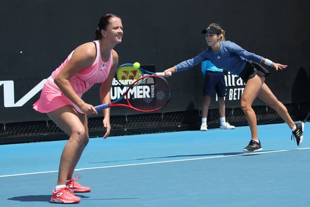 Anna Kalinskaya, RUS blue , and Viktoria Kuzmova, SVK pink , during 2021 Melbourne Summer Series AO pre tournaments in Melbourne, 06 02 2021