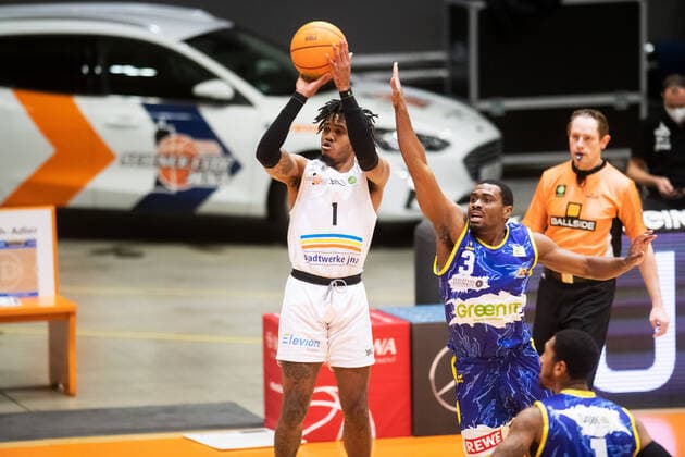 BARMER 2 Basketball Bundesliga ProA Season 2020 2021 Matchday 20 on 06 02 2021 Science City Jena vs Phoenix Hagen Kasey Jamal Hill Jena throwing against Kyron Nahshon Cartwright Hagen Sparkassen Arena Jena
