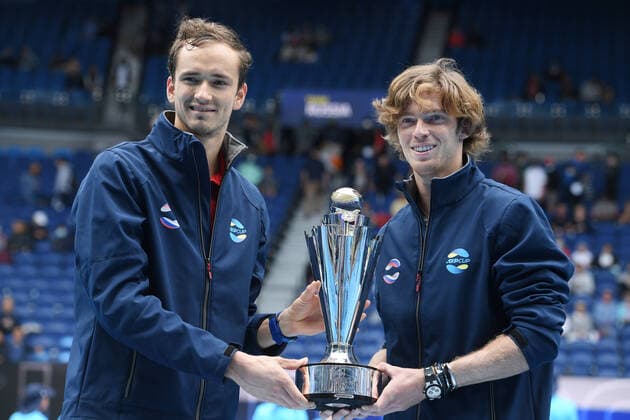 TENNIS ATP, Tennis Herren CUP, Team Russia players Daniil Medvedev (left) and Andrey Rublev (right) hold the trophy after winning the ATP Cup final against Team Italy on Rod Laver Arena at Melbourne Park in Melbourne, Sunday, February 7, 2021. ( NO ARCHIVING, EDITORIAL USE ONLY, NO USE IN BOOKS WITHOUT CONSENT MELBOURNE VIC AUSTRALIA  Copyright: xDEANxLEWINSx 20210207001518872127