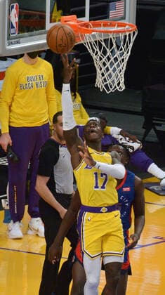 Los Angeles Lakers point guard Dennis Schroder scores on a reverse layup against the Detroit Pistons during the second quarter at Staples Center in Los Angeles on Saturday, February 6, 2021. The Lakers defeated the Pistons 135-129 in double-overtime.  LAP2021020626 JIMxRUYMEN