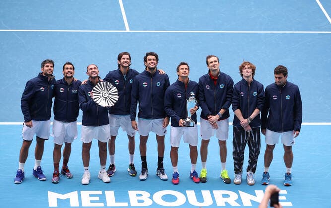 (210207) -- MELBOURNE, Feb. 7, 2021 -- Players of Russia (R) and players of Italy pose for photos during the victory ceremony after the final match between Russia and Italy of ATP, Tennis Herren cup at Melbourne Park, in Melbourne, Australia, Feb. 7, 2021. ) (SP)AUSTRALIA-MELBOURNE-TENNIS-ATP CUP-FINAL BaixXuefei 