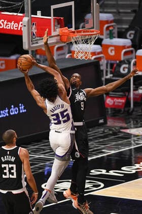 LOS ANGELES, CA - FEBRUARY 07: Sacramento Kings Forward Marvin Bagley III (35) goes up for a shot challenged by Los Angeles Clippers Center Serge Ibaka (9) during a NBA, Basketball Herren, USA game between the Sacramento Kings and the Los Angeles Clippers on February 7, 2021 at STAPLES Center in Los Angeles, CA. The game was played without fans due to the COVID-19 pandemic. (Photo by Brian Rothmuller Icon Sportswire) NBA: FEB 07 Kings at Clippers Icon210207007