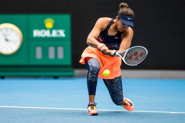 MELBOURNE, VIC - FEBRUARY 08: Naomi Osaka of Japan returns the ball during round 1 of the 2021 Australian Open on February 8 2020, at Melbourne Park in Melbourne, Australia. (Photo by Jason Heidrich Icon Sportswire) TENNIS: FEB 08 Australian Open Icon2102080061