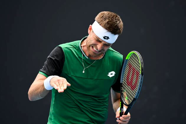 TENNIS AUSTRALIAN OPEN, Norbert Gombos of Slovakia reacts during his first Round Men s singles match against Alex Bolt of Australia on Day 1 of the Australian Open at Melbourne Park in Melbourne, Monday, February 8, 2021. ( NO ARCHIVING, EDITORIAL USE ONLY, NO USE IN BOOKS WITHOUT CONSENT MELBOURNE VIC AUSTRALIA  Copyright: xDEANxLEWINSx 20210208001519106692