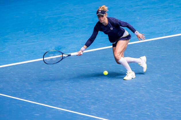 MELBOURNE, VIC - FEBRUARY 08: Laura Siegemund of Germany returns the ball during round 1 of the 2021 Australian Open on February 8 2020, at Melbourne Park in Melbourne, Australia. (Photo by Jason Heidrich Icon Sportswire) TENNIS: FEB 08 Australian Open Icon2102080811