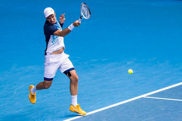 MELBOURNE, VIC - FEBRUARY 08: Mikhail Kukushkin of Kazakhstan returns the ball during round 1 of the 2021 Australian Open on February 8 2020, at Melbourne Park in Melbourne, Australia. (Photo by Jason Heidrich Icon Sportswire) TENNIS: FEB 08 Australian Open Icon2102081011