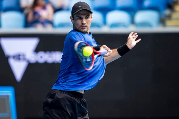 MELBOURNE, VIC - FEBRUARY 08: Marcos Giron of the United States of America returns the ball during round 1 of the 2021 Australian Open on February 8 2020, at Melbourne Park in Melbourne, Australia. (Photo by Jason Heidrich Icon Sportswire) TENNIS: FEB 08 Australian Open Icon2102081381