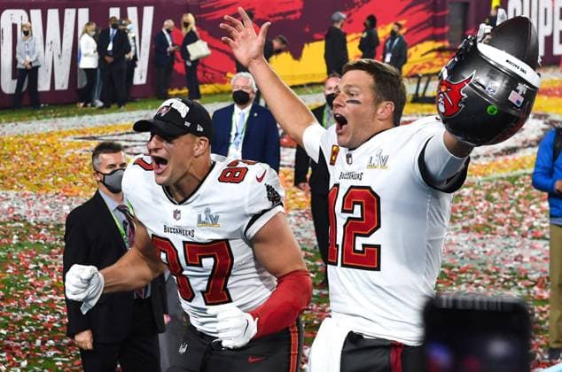Tampa Bay Buccaneers quarterback Tom Brady and Tight End Rob Gronkowski celebrate after defeating Kansas City Chiefs in Super Bowl LV, at Raymond James Stadium in Tampa, Florida on Sunday, February 7, 2021. The Buccaneers defeated the Chiefs 31-9 to win Super Bowl 55.  SBP20210208408 KEVINxDIETSCH