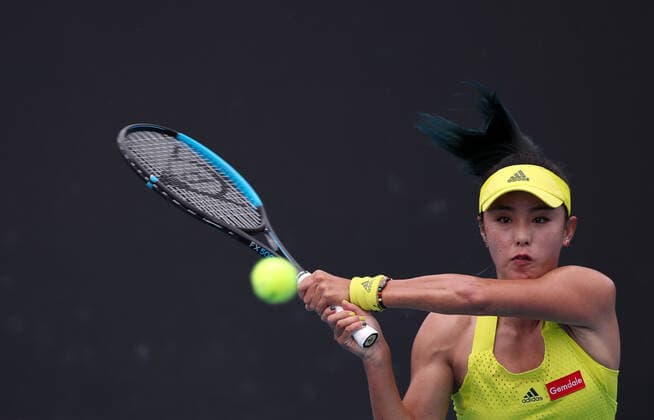 (210208) -- MELBOURNE, Feb. 8, 2021 -- Wang Qiang returns a shot during the women s singles first round match between Wang Qiang of China and Sara Errani of Italy at the Australian Open in Melbourne Park, Melbourne, Australia on Feb. 8, 2021. Bai Xuefei) (SP)AUSTRALIA-MELBOURNE-TENIS-AUSTRALIAN OPEN BaixXuefeihujingchen 
