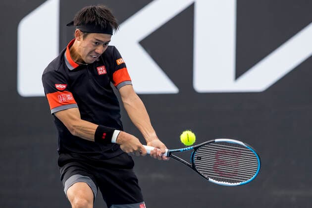 MELBOURNE, VIC - FEBRUARY 08: Kei Nishikori of Japan returns the ball during round 1 of the 2021 Australian Open on February 8 2020, at Melbourne Park in Melbourne, Australia. (Photo by Jason Heidrich Icon Sportswire) TENNIS: FEB 08 Australian Open Icon2102081971
