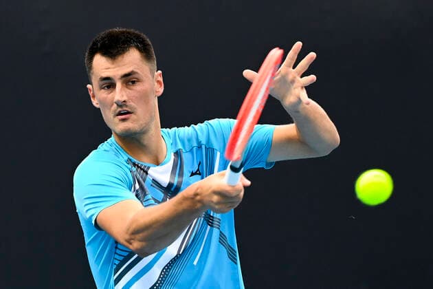TENNIS AUSTRALIAN OPEN, Bernard Tomic of Australia in action during his first Round Men s singles match against Yuichi Sugita of Japan on Day 1 of the Australian Open at Melbourne Park in Melbourne, Monday, February 8, 2021. ( NO ARCHIVING, EDITORIAL USE ONLY, NO USE IN BOOKS WITHOUT CONSENT MELBOURNE VIC AUSTRALIA  Copyright: xDAVExHUNTx 20210208001519146901