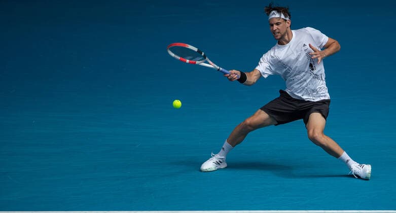 (210208) -- MELBOURNE, Feb. 8, 2021 -- Dominic Thiem returns a shot during the men s singles first round match between Dominic Thiem of Austria and Mikhail Kukushkin of Kazakhstan in Melbourne Park, Melbourne, Australia on Feb. 8, 2021. (Photo by Xinhua) (SP)AUSTRALIA-MELBOURNE-TENNIS-AUSTRALIAN OPEN HuxJingchen 