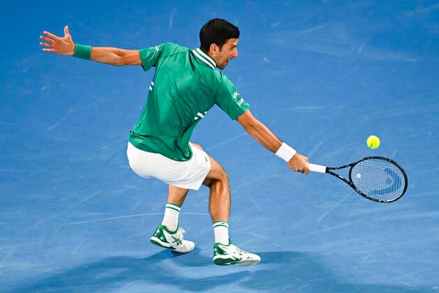 TENNIS AUSTRALIAN OPEN, Novak Djokovic of Serbia in action during his first Round Men s singles match against Jeremy Chardy of the United States of America on Day 1 of the Australian Open at Melbourne Park in Melbourne, Monday, February 8, 2021. ( NO ARCHIVING, EDITORIAL USE ONLY, NO USE IN BOOKS WITHOUT CONSENT MELBOURNE VIC AUSTRALIA  Copyright: xDAVExHUNTx 20210208001519174502