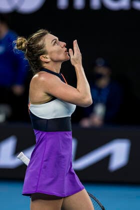 MELBOURNE, VIC - FEBRUARY 08: Simona Halep of Romania looks skywards and send off a kiss after winning her match during round 1 of the 2021 Australian Open on February 8 2020, at Melbourne Park in Melbourne, Australia. (Photo by Jason Heidrich Icon Sportswire) TENNIS: FEB 08 Australian Open Icon2102082471