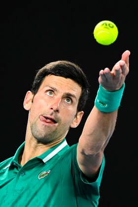 TENNIS AUSTRALIAN OPEN, Novak Djokovic of Serbia in action during his first Round Men s singles match against Jeremy Chardy of the United States of America on Day 1 of the Australian Open at Melbourne Park in Melbourne, Monday, February 8, 2021. ( NO ARCHIVING, EDITORIAL USE ONLY, NO USE IN BOOKS WITHOUT CONSENT MELBOURNE VIC AUSTRALIA  Copyright: xDAVExHUNTx 20210208001519180366