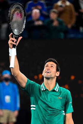TENNIS AUSTRALIAN OPEN, Novak Djokovic of Serbia celebrates after winning his first Round Men s singles match against Jeremy Chardy of the United States of America on Day 1 of the Australian Open at Melbourne Park in Melbourne, Monday, February 8, 2021. ( NO ARCHIVING, EDITORIAL USE ONLY, NO USE IN BOOKS WITHOUT CONSENT MELBOURNE VIC AUSTRALIA  Copyright: xDAVExHUNTx 20210208001519181274