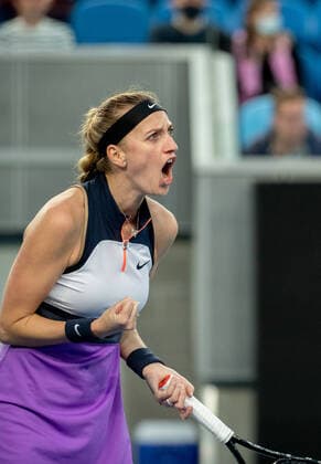 (210208) -- MELBOURNE, Feb. 8, 2021 -- Petra Kvitova of the Czech Republic celebrates after scoring during the women s singles first round match against Greet Minnen of Belgium at the Australian Open tennis championship in Melbourne, Australia, Feb. 8, 2021. (Photo by Hu Jingchen Xinhua) (SP)AUSTRALIA-MELBOURNE-TENNIS-AUSTRALIAN OPEN-DAY 1 BaixXuefeihujingchen 