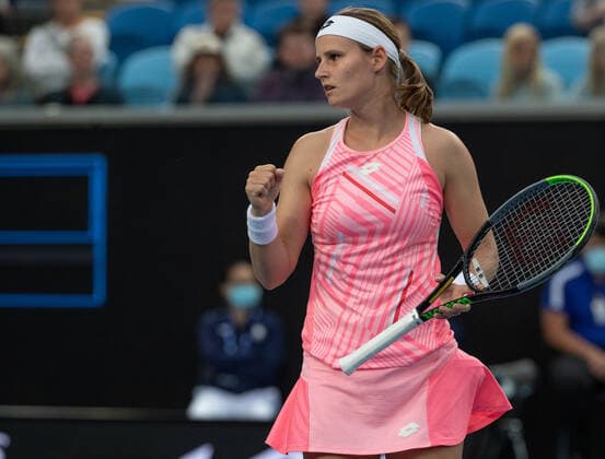 (210208) -- MELBOURNE, Feb. 8, 2021 -- Greet Minnen of Belgium celebrates scoring during the women s singles first round match against Petra Kvitova of the Czech Republic at the Australian Open tennis championship in Melbourne, Australia, Feb. 8, 2021. (Photo by Hu Jingchen Xinhua) (SP)AUSTRALIA-MELBOURNE-TENNIS-AUSTRALIAN OPEN-DAY 1 BaixXuefeihujingchen 