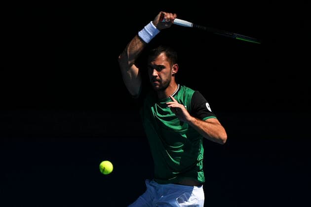 TENNIS AUSTRALIAN OPEN, Laslo Djere of Serbia in action during his first Round Men s singles match against Rafael Nadal of Spain on Day 2 of the Australian Open at Melbourne Park in Melbourne, Tuesday, February 9, 2021. ( NO ARCHIVING, EDITORIAL USE ONLY, NO USE IN BOOKS WITHOUT CONSENT MELBOURNE VIC AUSTRALIA  Copyright: xDEANxLEWINSx 20210209001519332358