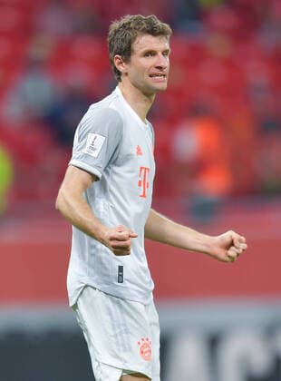 (210209) -- DOHA, Feb. 9, 2021 -- Thomas Mueller of Bayern Munich reacts during the FIFA Club World Cup semi-final football match between Egypt s Al Ahly and Germany s Bayern Munich at Ahmad Bin Ali Stadium in Doha, capital of Qatar, Feb. 8, 2021. (Photo by Nikku Xinhua) (SP)QATAR-DOHA-FIFA CLUB WORLD CUP-BAYERN MUNICH VS AL AHLY yangyuanyong 