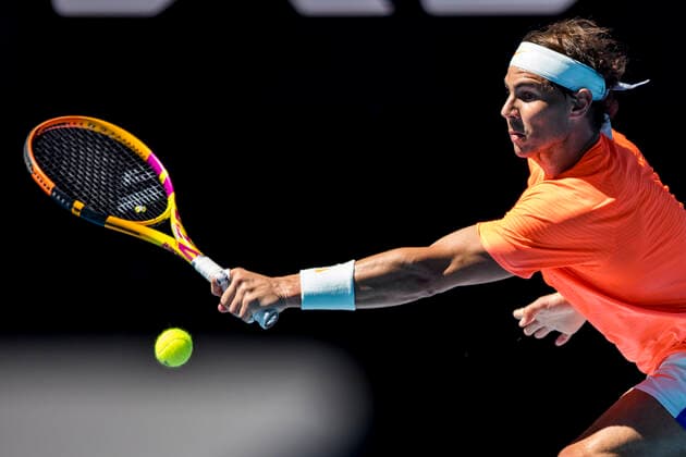 MELBOURNE, VIC - FEBRUARY 09: Rafael Nadal of Spain returns the ball during round 1 of the 2021 Australian Open on February 9 2020, at Melbourne Park in Melbourne, Australia. (Photo by Jason Heidrich Icon Sportswire) TENNIS: FEB 09 Australian Open Icon2102091082