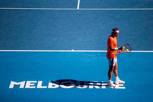 MELBOURNE, VIC - FEBRUARY 09: Rafael Nadal of Spain prepares to serve during round 1 of the 2021 Australian Open on February 9 2020, at Melbourne Park in Melbourne, Australia. (Photo by Jason Heidrich Icon Sportswire) TENNIS: FEB 09 Australian Open Icon2102091512