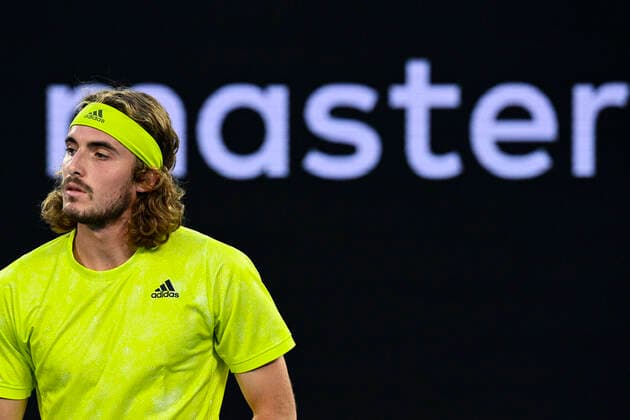 TENNIS AUSTRALIAN OPEN, Stefanos Tsitsipas of Greece reacts during his first Round Men s singles match against Gilles Simon of France on Day 2 of the Australian Open at Melbourne Park in Melbourne, Tuesday, February 9, 2021. ( NO ARCHIVING, EDITORIAL USE ONLY, NO USE IN BOOKS WITHOUT CONSENT MELBOURNE VIC AUSTRALIA  Copyright: xDEANxLEWINSx 20210209001519364325