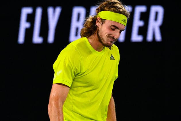 TENNIS AUSTRALIAN OPEN, Stefanos Tsitsipas of Greece reacts during his first Round Men s singles match against Gilles Simon of France on Day 2 of the Australian Open at Melbourne Park in Melbourne, Tuesday, February 9, 2021. ( NO ARCHIVING, EDITORIAL USE ONLY, NO USE IN BOOKS WITHOUT CONSENT MELBOURNE VIC AUSTRALIA  Copyright: xDEANxLEWINSx 20210209001519370761