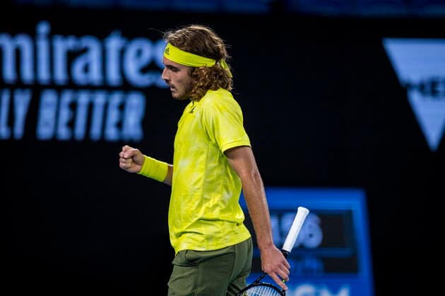 MELBOURNE, VIC - FEBRUARY 09: Stefanos Tsitsipas of Greece celebrates after winning a game during round 1 of the 2021 Australian Open on February 9 2020, at Melbourne Park in Melbourne, Australia. (Photo by Jason Heidrich Icon Sportswire) TENNIS: FEB 09 Australian Open Icon2102092102