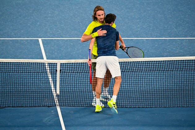 TENNIS AUSTRALIAN OPEN, Stefanos Tsitsipas of Greece is congratulated by Gilles Simon of France after winning his first Round Men s singles match on Day 2 of the Australian Open at Melbourne Park in Melbourne, Tuesday, February 9, 2021. ( NO ARCHIVING, EDITORIAL USE ONLY, NO USE IN BOOKS WITHOUT CONSENT MELBOURNE VIC AUSTRALIA  Copyright: xDEANxLEWINSx 20210209001519373116