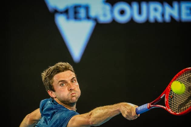 French Gilles Simon plays a forehand during a tennis match between French Simon and Greek Tsitsipas, in the first round of the men s singles competition of the Australian Open tennis Grand Slam, Tuesday 09 February 2021 in Melbourne Park, Melbourne, Australia. The 2021 edition of the Australian Grand Slam has been delayed by three weeks because of the pandemic. PATRICKxHAMILTON  x2640794x