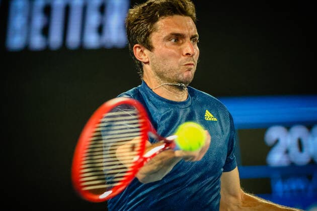 French Gilles Simon plays a forehand during a tennis match between French Simon and Greek Tsitsipas, in the first round of the men s singles competition of the Australian Open tennis Grand Slam, Tuesday 09 February 2021 in Melbourne Park, Melbourne, Australia. The 2021 edition of the Australian Grand Slam has been delayed by three weeks because of the pandemic. PATRICKxHAMILTON  x2640801x