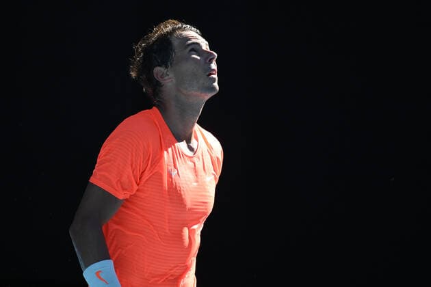 TENNIS AUSTRALIAN OPEN, Rafael Nadal of Spain looks up to the sky after his first Round win in his Men s singles match against Laslo Djere of Serbia on Day 2 of the Australian Open at Melbourne Park in Melbourne, Tuesday, February 9, 2021. ( NO ARCHIVING, EDITORIAL USE ONLY, NO USE IN BOOKS WITHOUT CONSENT MELBOURNE VIC AUSTRALIA  Copyright: xDEANxLEWINSx 20210210001519389027