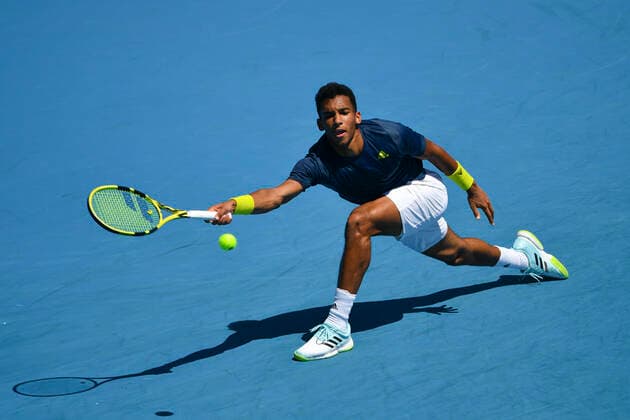 TENNIS AUSTRALIAN OPEN, Felix Auger Aliassime of Canada in action during his second Round Men s singles match against James Duckworth of Australia on Day 3 of the Australian Open at Melbourne Park in Melbourne, Wednesday, February 10, 2021. ( NO ARCHIVING, EDITORIAL USE ONLY, NO USE IN BOOKS WITHOUT CONSENT MELBOURNE VIC AUSTRALIA  Copyright: xJAMESxROSSx 20210210001519527666